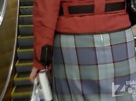 Up1601#A girl in a gray plaid skirt. Big Ass in pantyhose and white panties.