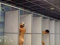 Sh1326#Women take a shower after the pool. They lather their tanned body and are being spray