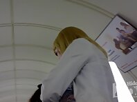 Up1943#Blonde in a short black skirt. Nice ass in pink panties with white lining. The girl d