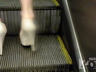 Up2022#Another chick in a short colorful skirt. She also seems to have noticed the manipulat