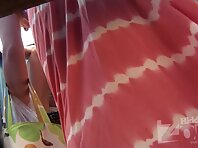 Bc2291#Brunette in a red bathing suit changes clothes in a beach cabin. Our cameraman filmed