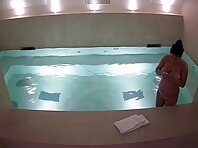 Pv35884#Hiddencam in the swimming pool. A hidden camera caught a completely naked tanned baby