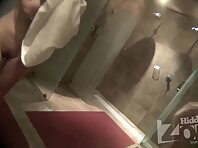 Sh1725#One of the girls went into the shower in a bathing suit. But then she took it off and