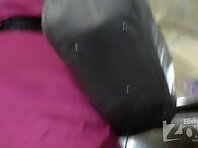 Up2115#Tanned brunette in a short pink dress. Round tanned ass and shaved crotch in pink pan