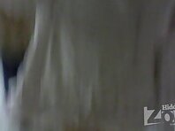 Up1773#Slim blonde in a short white coat. Nice ass in white panties and pantyhose. The girl 