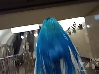 Up2970#Upskirt to a slender girl in a short blue skirt. In the lens of our spy camera was he