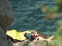 Nu1212#Naked girl got a girl in full growth and looks towards the sea. Our operator shoots h