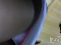 Up2144#Tanned brunette in a short white skirt. Our operator was able to make some great shot