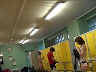 Lo1229#A young girl undresses and puts on a swimming cap. We admire her beautiful tits elast