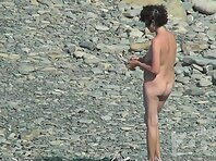 Nu2095#We are again on a nudist beach. A pregnant woman walks along the shore. Her tits with