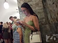 Up4291#Under the skirt of a tanned girl in a green sundress. Our cameraman managed to slip h