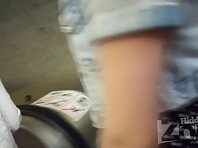 Up2956#Upskirt blonde woman in a short black skirt. Beautiful round ass and shaved crotch in