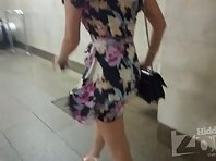 Up2974#Under the skirt of a blonde in a short multi-colored dress. Another great model for s