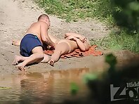 Nu1772#Sex on the beach continues. Man working hand in pussy of his girlfriend. It is widely