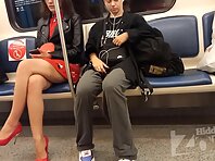 Up3009#Upskirt to slender brunette in a short red skirt. Our operator several times put his 