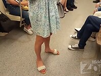 Up2966#Under the skirt of a tanned girl in a short blue dress. Our spy camera caught her rou