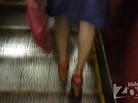 Up2134#Girl in wide blue sundress. Beautiful tanned thighs and shaved crotch in white pantie