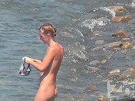 Nu1467#Nudists spend their typical summer day. Bathe, socialize. They do not know that they 