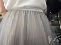 Up2835#Upskirt girl in a wide blue skirt. Our operator several times put his hand with a cam