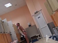 Lo1283#Tanned babe takes off her bikini and wiped after a shower in the pool locker room. Be