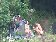 Nu1265#The company of nudists is preparing for barbecues on a nude beach voyeur. Naked girl 