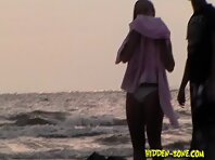 Nu1146#Two girls come out of the water, my camera follows closely behind them.