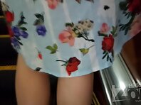 Up2883#Under the skirt of a tanned blonde in a multi-colored dress. Great shots of the pubis