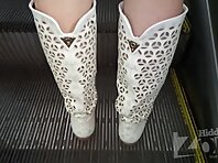 Up2547#Under the skirt of a slender blonde in a short blue dress. Our operator managed to ma