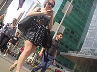 Up4286#Under the skirt of a girl in a blue and white dress. Our cameraman managed to catch a