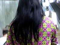 Up2660#Under the skirt of a slender brunette. In the lens of the hidden camera came her shav