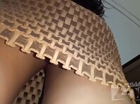 Up4129#Upskirt of a tanned girl in a short brown dress. Our cameraman slipped his hand under