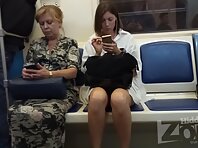 Up2868#Upskirt to a slim girl in a short beige skirt. Gorgeous ass and shaved crotch in whit