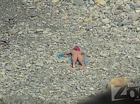 Nu2101#Our camera continues to follow the young beauty, who sunbathes spreading legs. Close 