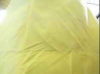 Up1628#A woman in a yellow dress. Beautiful ass and yellow panties.