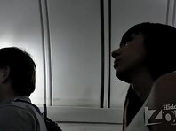 Up2186#The slender brunette in a short white skirt. Our operator was able to shoot a close-u