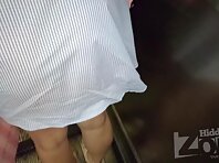 Up3013#Under the skirt of a brunette in a short blue dress. Our hidden camera caught her rou