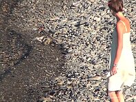 Nu1601#In this video, Nude beach voyeur cam switches between different girls. Nudists are bu