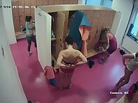 Lo2039#After a shower, women return to the locker room and again we see many naked bodies. Y