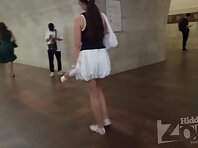 Up4364#Upskirt of a girl in a short white dress. Our cameraman repeatedly slipped his hand u