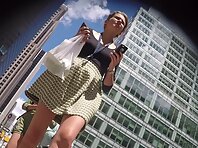 Up4228#Upskirt of a girl in a wide, multicolored skirt. Our cameraman caught a close-up of h