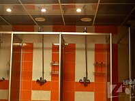 Sh1201#Girls and women take a shower after the pool. They are washed directly across from ou