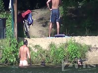 Nu1258#Girls swim and came out of the water. One of them is gone, and the other was left to 