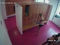 Lo1992#In the locker room is a beautiful long-haired brunette. She dries her hair and is not