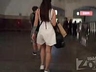 Up4093#Up the skirt of a girl in a short white dress. Our cameraman brazenly reached under h