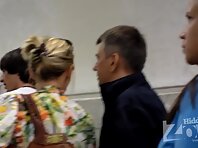 Up1664#Tanned babe in black skirt. Beautiful tanned ass in white thong. Great upskirt.