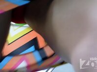 Up2045#Tanned blonde in a short multi-colored dress. Great shots shaved crotch close-up. Ano