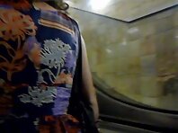 Up1614#Girl in a wide purple dress. Beautiful ass in black panties with white lining and bla