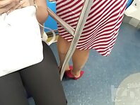 Up2826#Under the skirt of a slender girl in a striped dress. Beautiful ass and shaved crotch