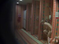 Sh1050#A woman takes a swimsuit and take a shower after the pool. And we see her hair on her