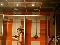 Sh1198#Girls and women take a shower after the pool. They are washed directly across from ou